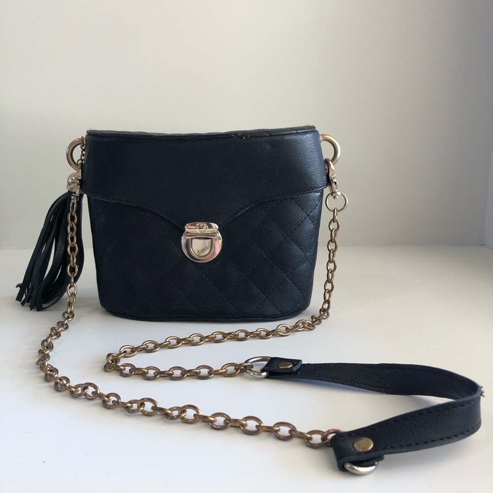 Unique shape black quilted bag with tassel